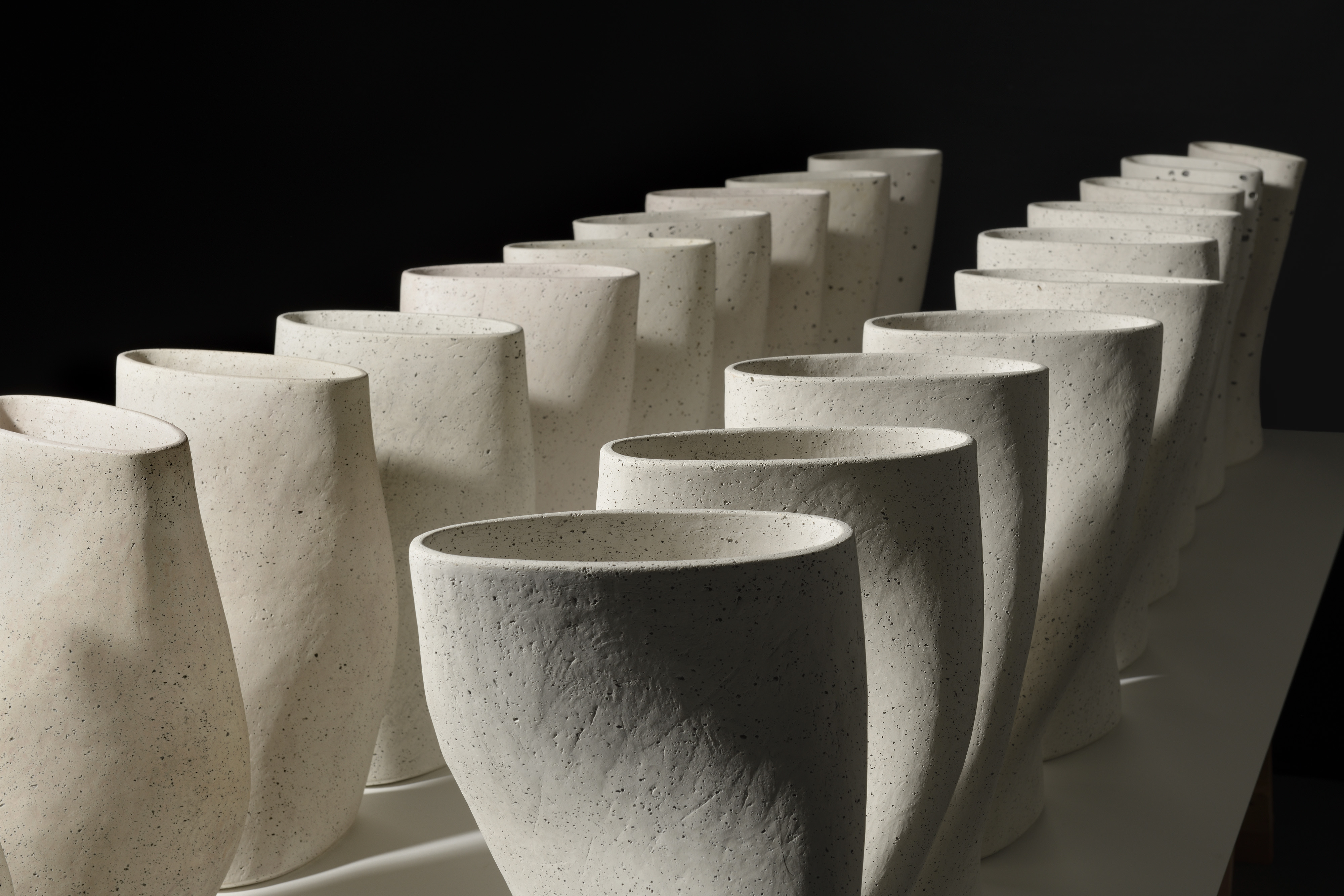 The 26 forms twist from a constant elliptical base, gradually following the angle of sunrise at 52 degrees North from the summer to winter solstice. They return following the angle of sunset from the winter to summer solstice. Photo credit Douglas Atfield