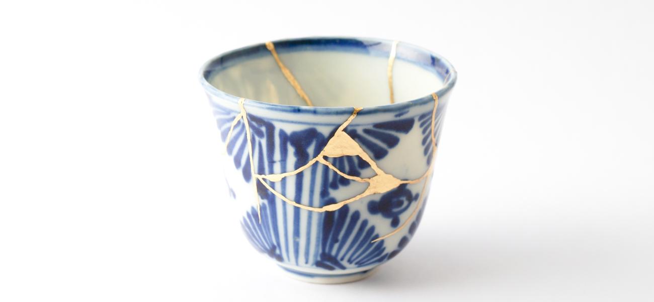 Antique Japanese kintsugi soba cup restored with gold. Photo by Marco Montalti