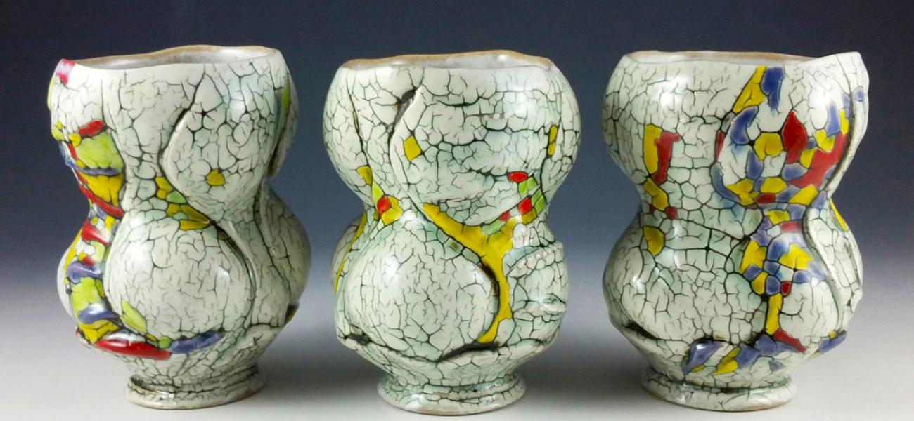 Eric Botbyl. Scraggler Cups, 2018. 5.25 in. tall. Thrown and altered stoneware, multiple slips and underglazes, multiple firings to 2232°F. Collection of Rebecca Spector. Photograph by author.