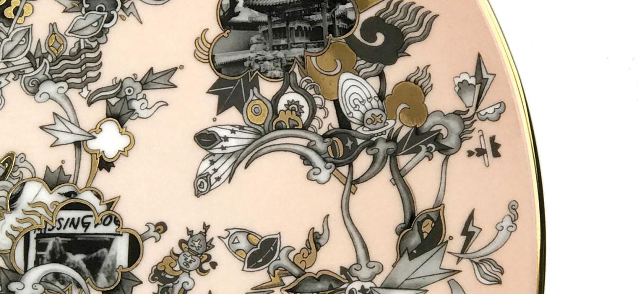 Yu Jiaqi, Through the Looking Glass; serving platter detail, 2017. Bone china, slipcast, overglaze decals, gold luster decals, hand painted overglaze and gold luster, 1 x 12.5 x 12.5 in. Photograph by Nick Geankoplis.