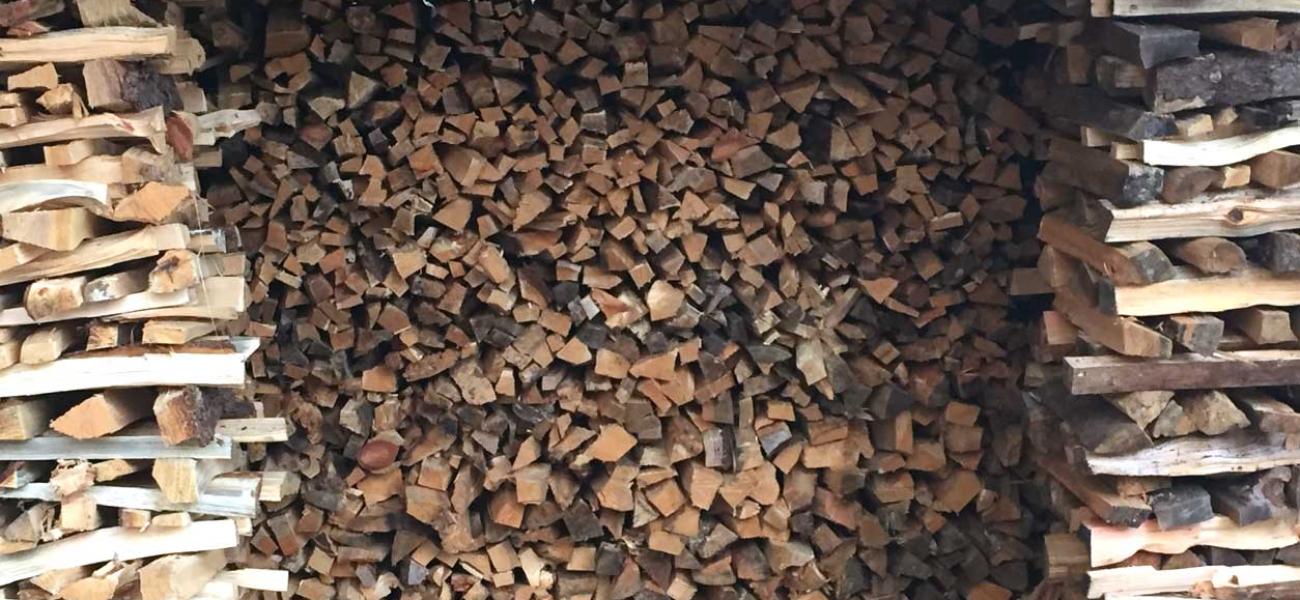Kristin Muller's wood stack - fuel for her kiln. 