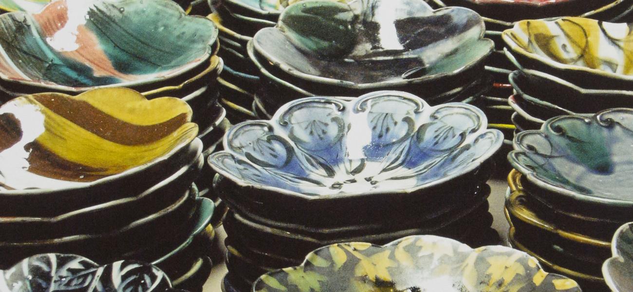 Sean O'Connell. Salad Days Plates, greenware (rear), glazed earthenware (front), 2009.