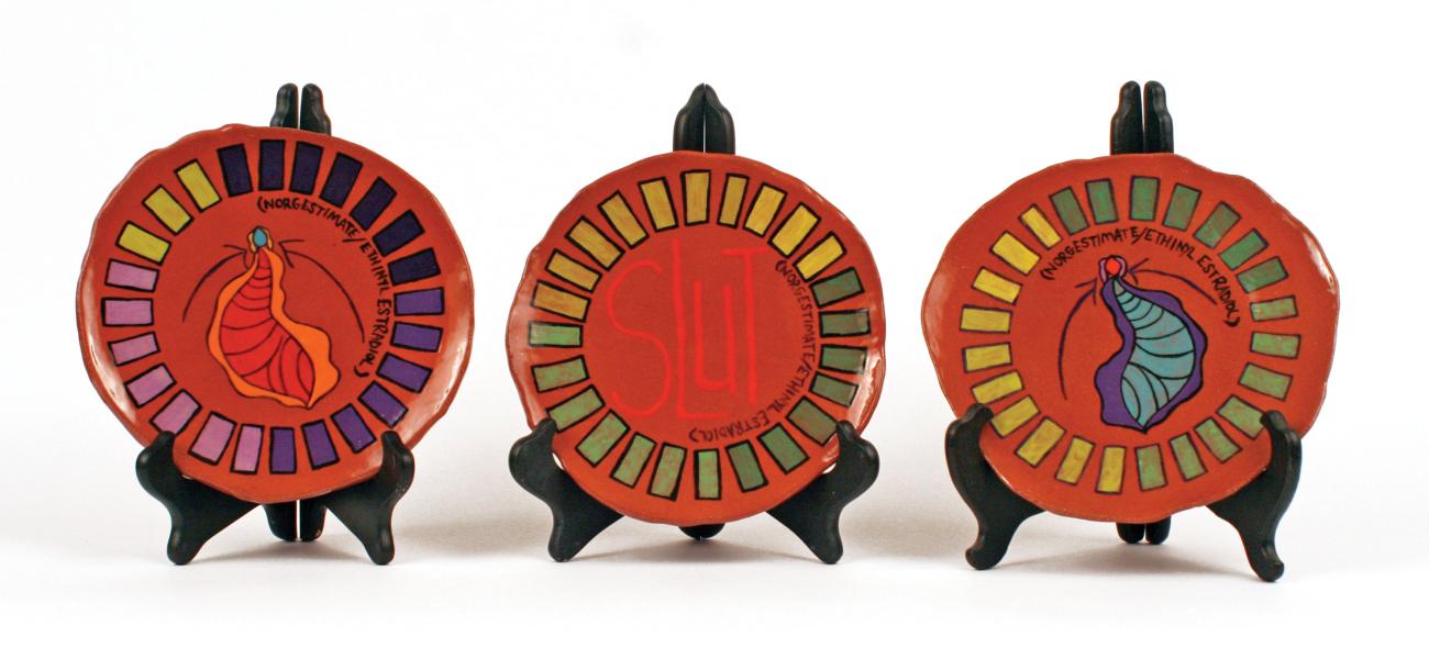 Dani Sigler. Birth Control Plates, 2013. Red Earthenware, underglazes, glazes. 8 x 1.5 in. each. Photo by artist.