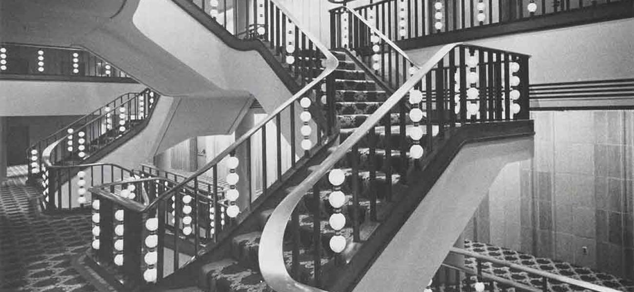 Lobby detail with 3-story, plum-colored terra cotta wall by Hardy, Holtzman, Pfeiffer, Associates, for the Ohio Theatre Galbreath Pavilion Addition, Columbus, Ohio (1984). (Photo: Cervin Robinson.)