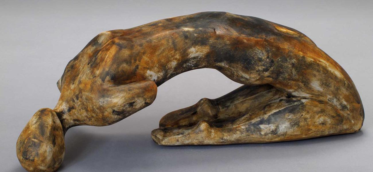 Shelley Schreiber. Bending Over Backwards II, 2013. Hand-built stoneware with stains; Cone 6 oxidation. 6 x 17 x 18 in. Photo by artist.