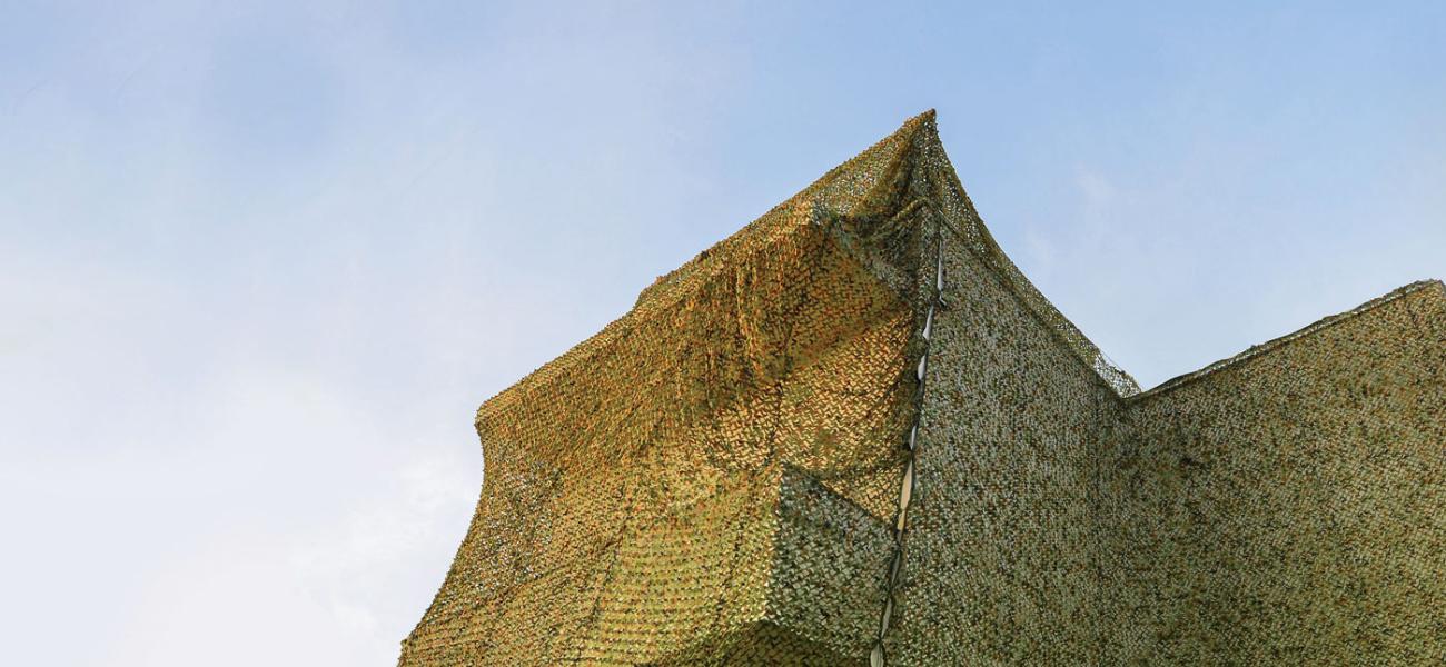 Ayelet Zohar, Villa in the Jungle, 2016. Camouflage nets over Benyamini Center. Photograph by Yael Gurand Zamir Nega.