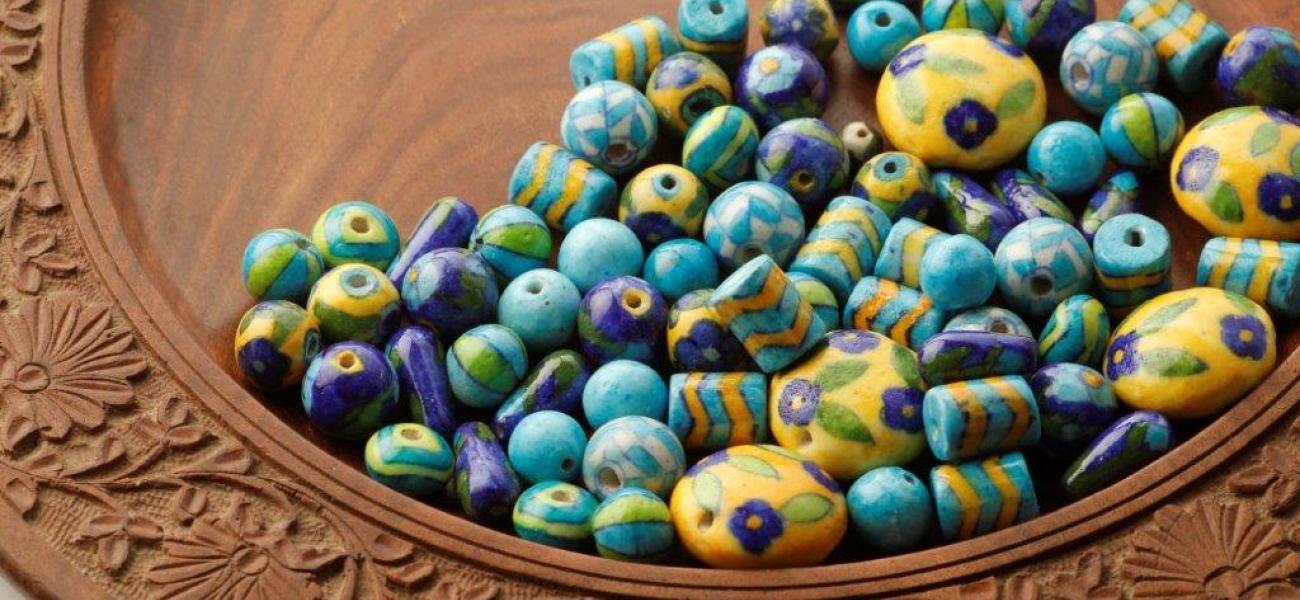 Neerja International. Jaipur blue pottery beads for making accessories.