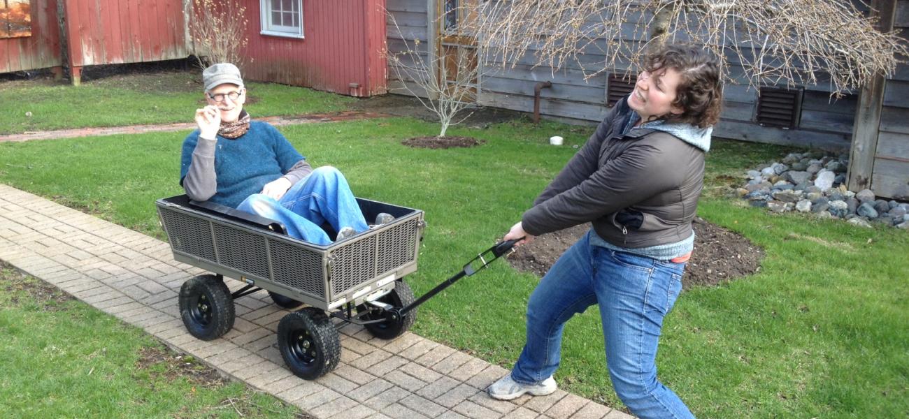 Assistant Julia Walther and John Glick horsing around at Plum Tree Pottery, West Bloomfield, Michigan, c. 2012.