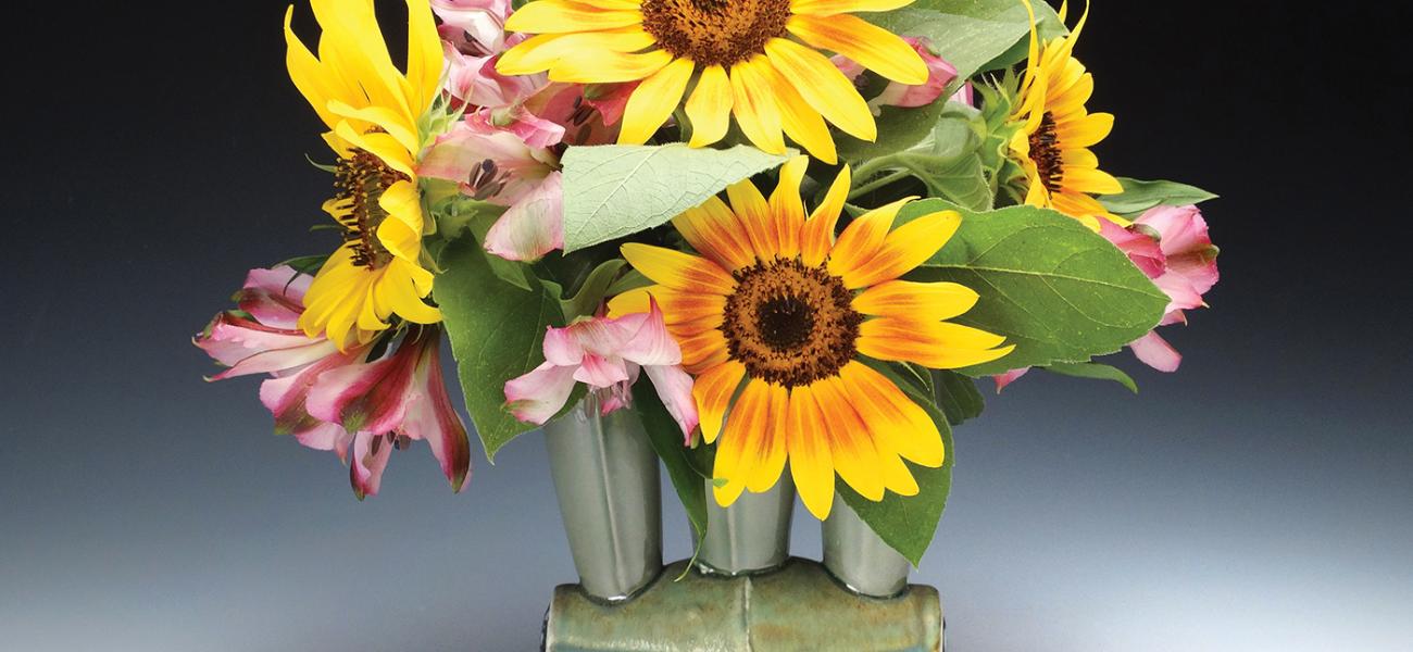 Frank Saliani, Vase with Sunflowers, 2014. Colored, cast and assembled porcelain, cone 6 oxidation. 5 x 5 x 3 in. Photo by artist.