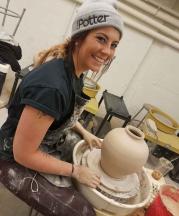 Jennifer Markmanrud on the wheel at the NHIA, Manchester, New Hampshire. Photograph by Maureen Mills.