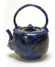 Norm Schulman. Blue Teapot, 1989. Salt-glazed porcelain. 8.5 x 7 x 5.75 in. Collection of Collection of Dorothy and Clyde Collins.