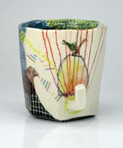 Optimism, 2015. Porcelain and decals, thrown and altered, fired at Cone 6, 03, and 014 in oxidation. 3.75 x 4 x 3.5 in. Photograph by Grace Sheese.