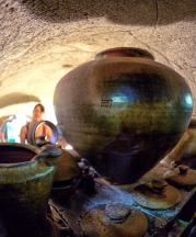 Inside Kevin Crowe's kiln just after the first firing of his rebuilt anagama kiln. Ty River Pottery, Amherst, Virginia. Photograph by Peter Rausse, 2015.