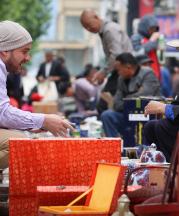 Nick Vest buying two objects at the Ghost Market  to start work with. Photo by Wu Fan