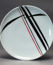 Shelley Schreiber. Platter, 2016. Wheel-thrown porcelain with colored slip, underglaze and  glaze, Cone 10 reduction, 1 x 12.5 in. Photo by artist.