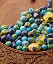 Neerja International. Jaipur blue pottery beads for making accessories.
